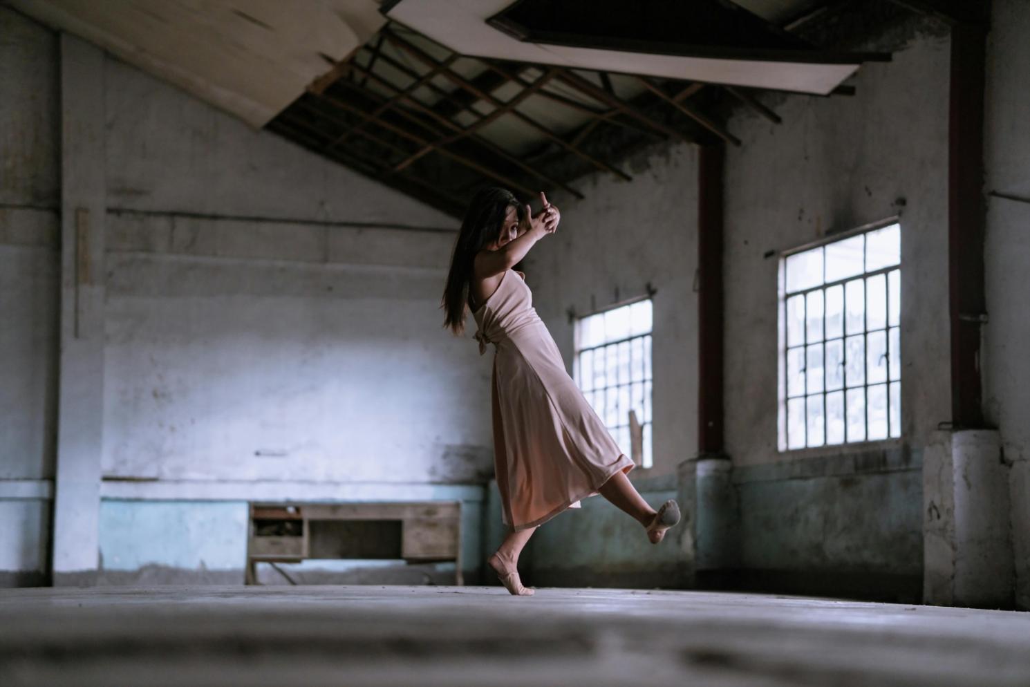 Jazz dance training session showing proper form and technique
